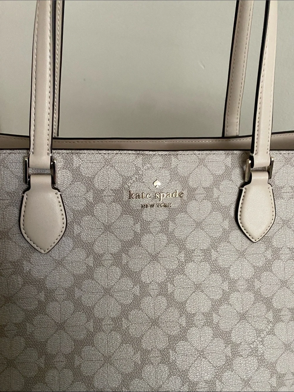 Kate Spade New York Signature Spade Flower East West Laptop Tote in Dark Beige